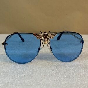 Women’s Elegant Blue Aviator Sunglasses with Gold Insect Detail